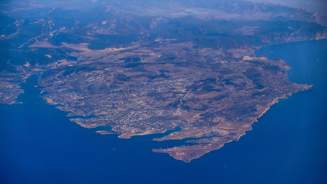Sevastopol, on the Crimean peninsula, seen from the window of the P-8A. Crimea, occupied and annexed by Russia in 2014, is home to Moscow's Black Sea fleet and the US Navy keeps tabs on Russian military assets stationed here.