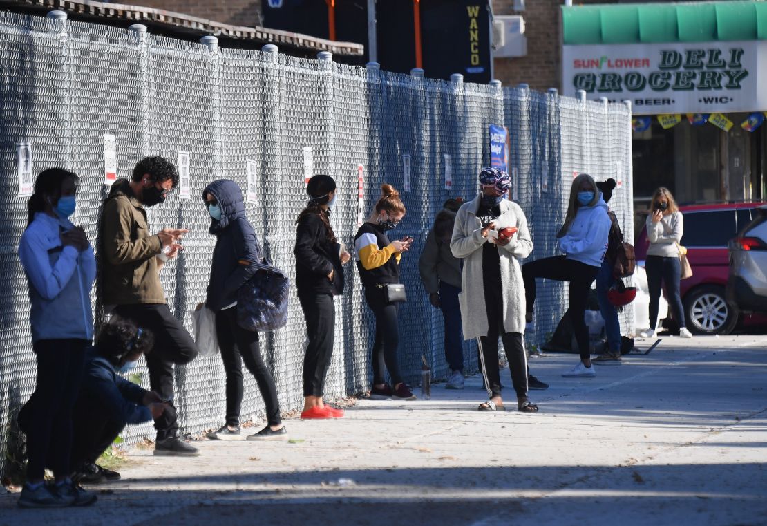 People wait in line Tuesday at a Covid-19 testing center in Borough Park, Brooklyn.