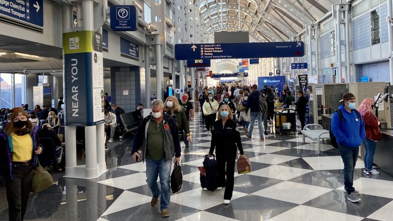 <strong>6. Chicago O'Hare International Airport:</strong> An October 2020 photo shows a steady stream of passengers at O'Hare International Airport, where traffic plunged by 57.6% in the first half of 2020. In 2019, there were nearly 85 million passengers.