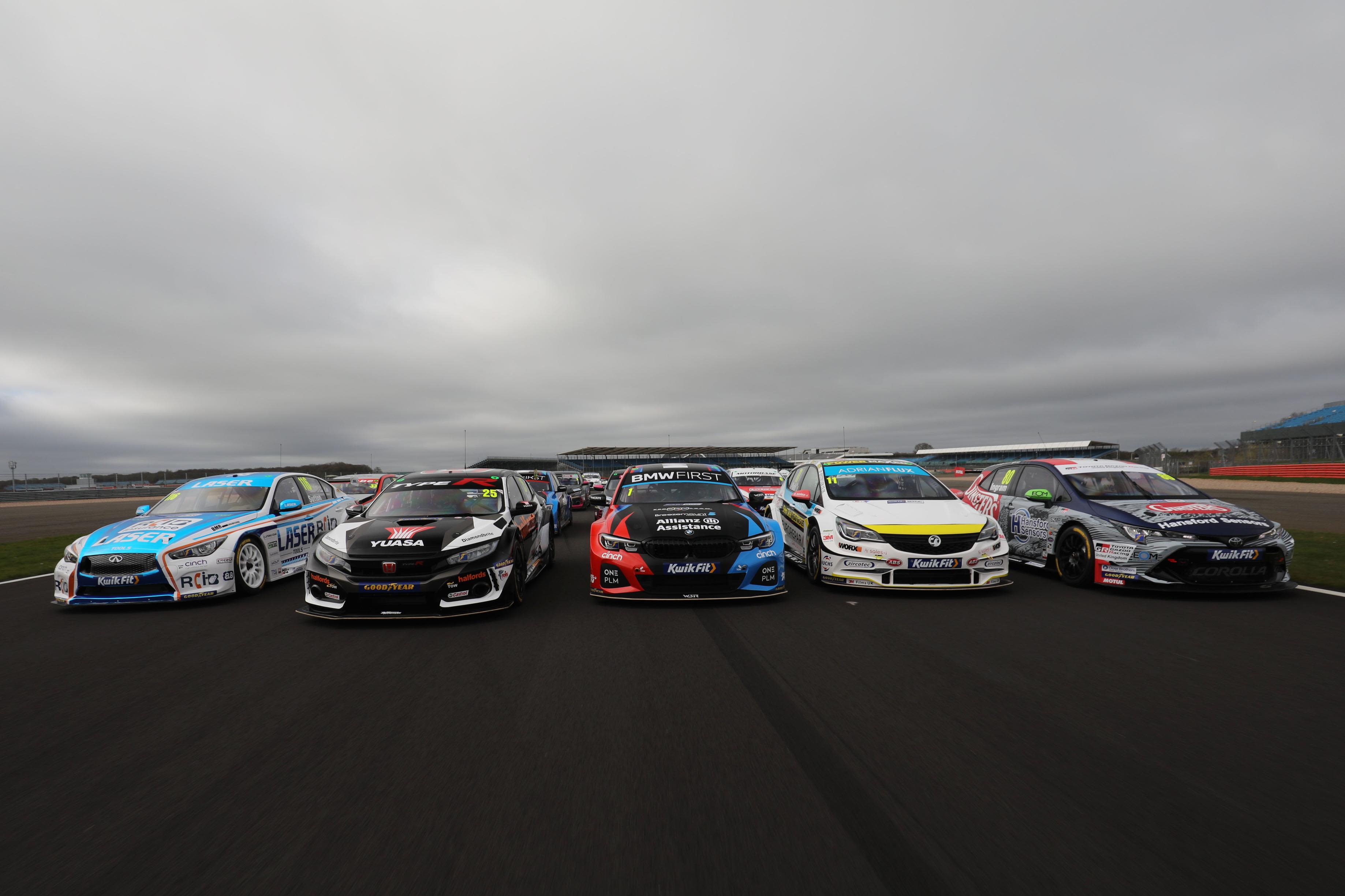Racing cars lining up at Silverstone. The British Touring Car Championship was <a href="index.php?page=&url=https%3A%2F%2Fwww.btcc.net%2Fabout%2F" target="_blank" target="_blank">established</a> in 1958.