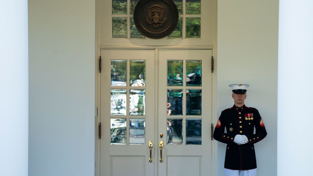 A Marine is posted outside the West Wing of the White House, signifying the President is in the Oval Office, Wednesday, Oct. 7, 2020, in Washington. (AP Photo/Evan Vucci)