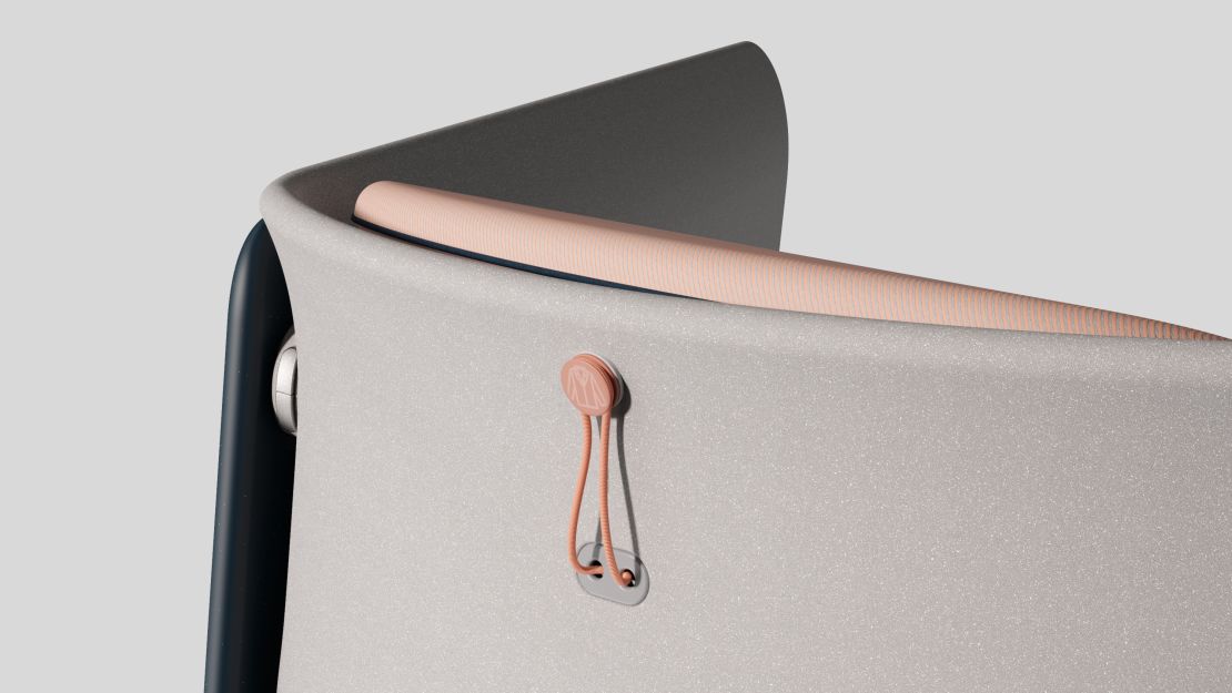 "Super open and super lightweight" is how the design in described. A very minimal strap serves as a coat hook.