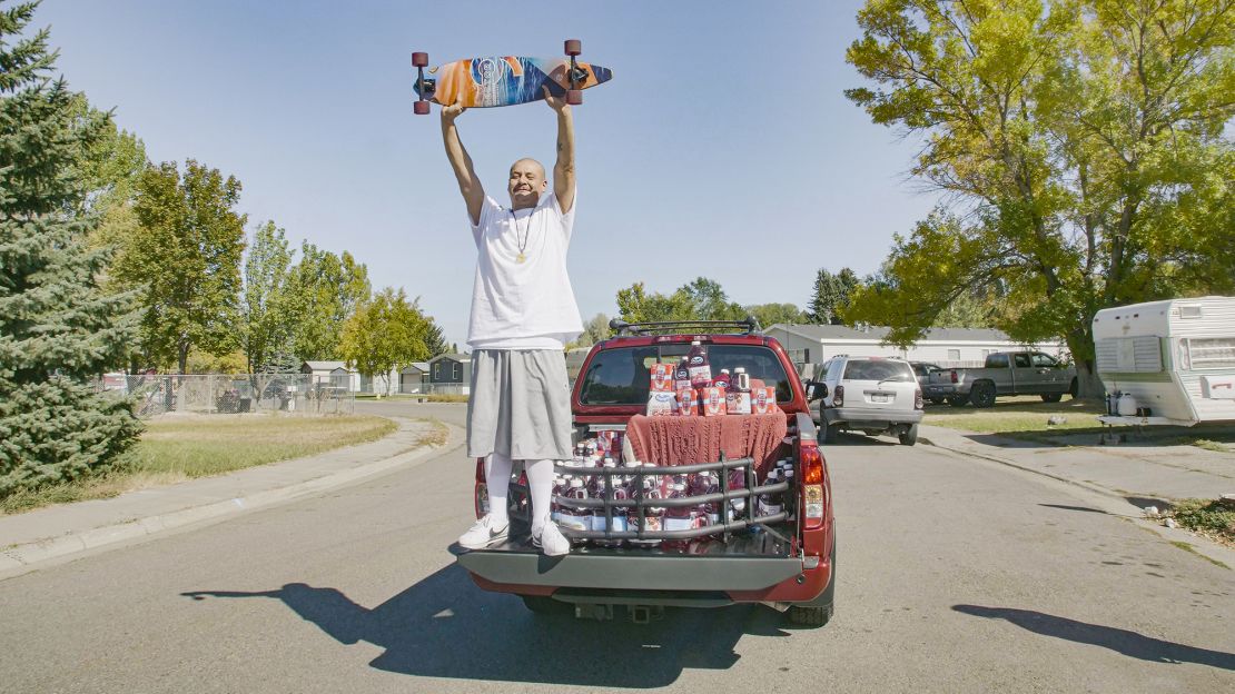 The truck is cranberry colored and had a large stock of Ocean Spray juice in the bed. 