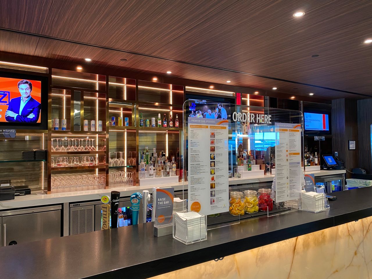 The Sky Club does not allow patrons to sit at the bar, and ordering must be done on the other side of the plexiglass.