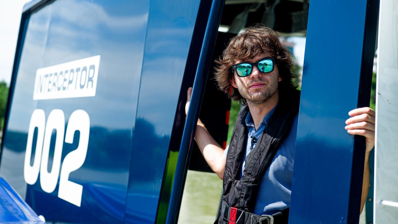 The Ocean Cleanup founder Boyan Slat surveys plastic pollution floating in the Klang river in Malaysia.