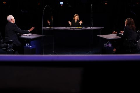 Moderator Susan Page sits between Vice President Mike Pence and US Sen. Kamala Harris at the vice presidential debate on Wednesday, October 7.