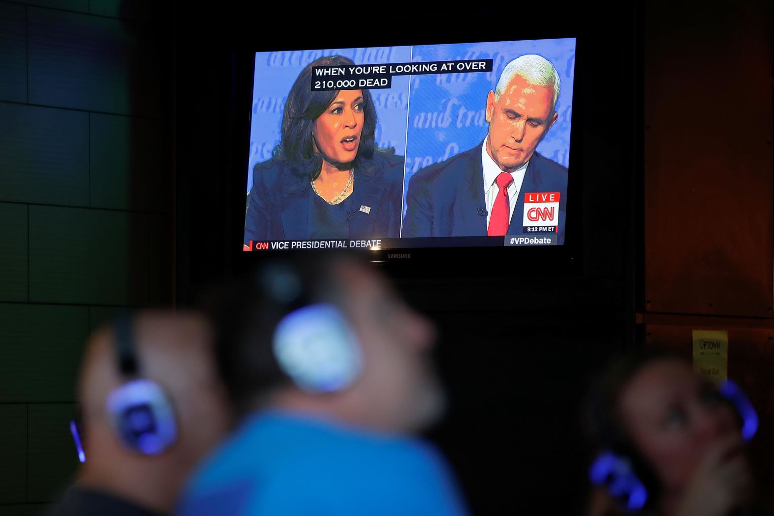 People watch the debate from a tavern in San Diego.