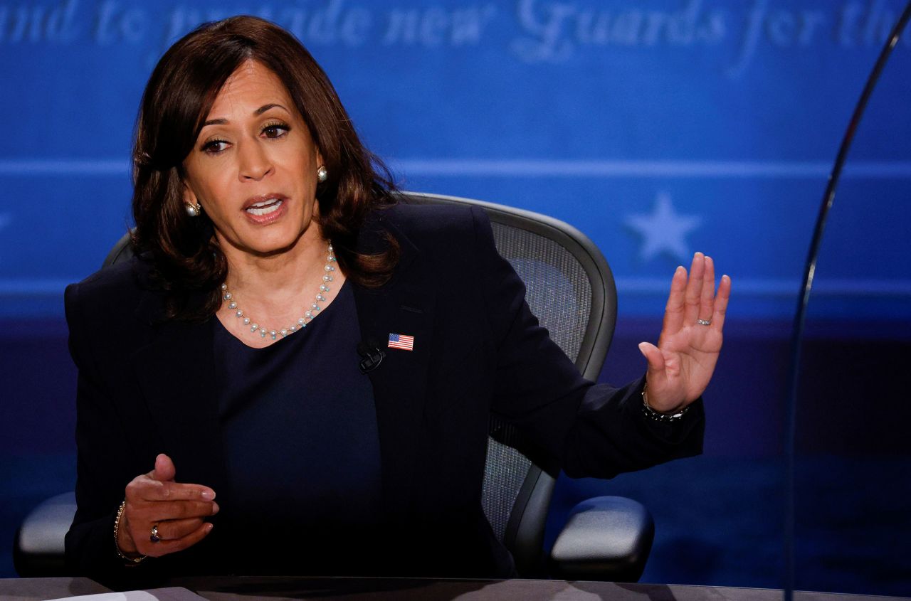 Harris gestures at Pence while answering a question during the debate. She made history Wednesday, becoming the first Black and South Asian woman to participate in a general election debate.