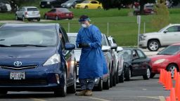 People line up in their vehicles to undergo the coronavirus disease (COVID-19) tests, distributed by the Wisconsin National Guard at the United Migrant Opportunity Services center, as cases spread in the Midwest, in Milwaukee, Wisconsin, U.S., October 2, 2020. REUTERS/Alex Wroblewski