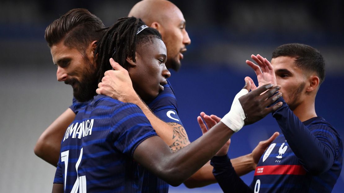 Camavinga (middle) is congratulated by teammates after scoring against Ukraine.