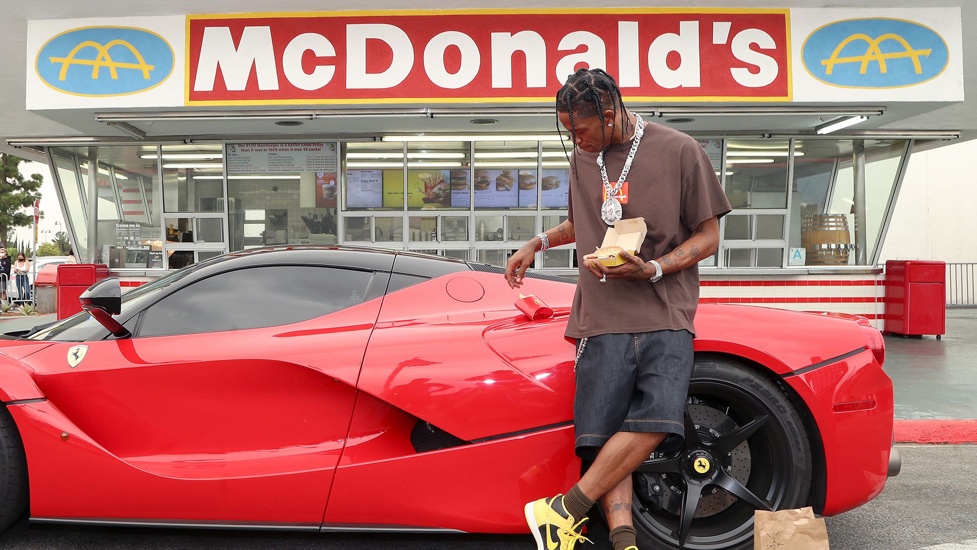 Travis Scott surprises crew and customers at McDonald's for the launch of the Travis Scott Meal on September 8, 2020 in Downey, California.