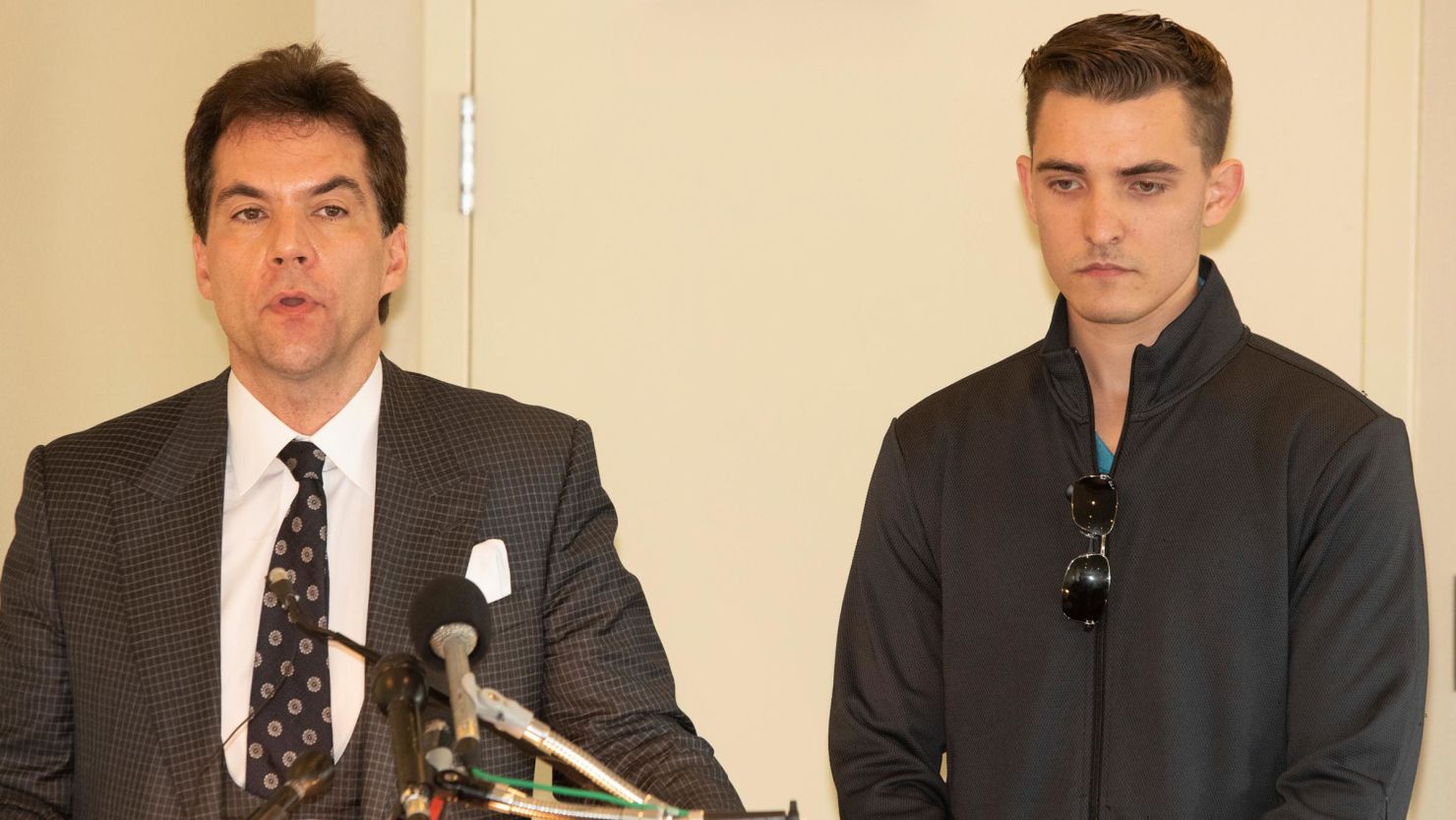 Jack Burkman and Jacob Wohl speak to the media in 2018 in Rosslyn, Virginia.