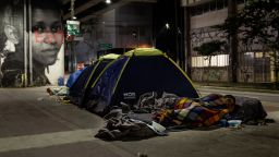 Homeless people sleep in tents in the sidewalk in downtown on August 28, 2020 in Sao Paulo, Brazil.  Due to the pandemic, unemployment is rising and the number of people living on the streets has increased considerably. 