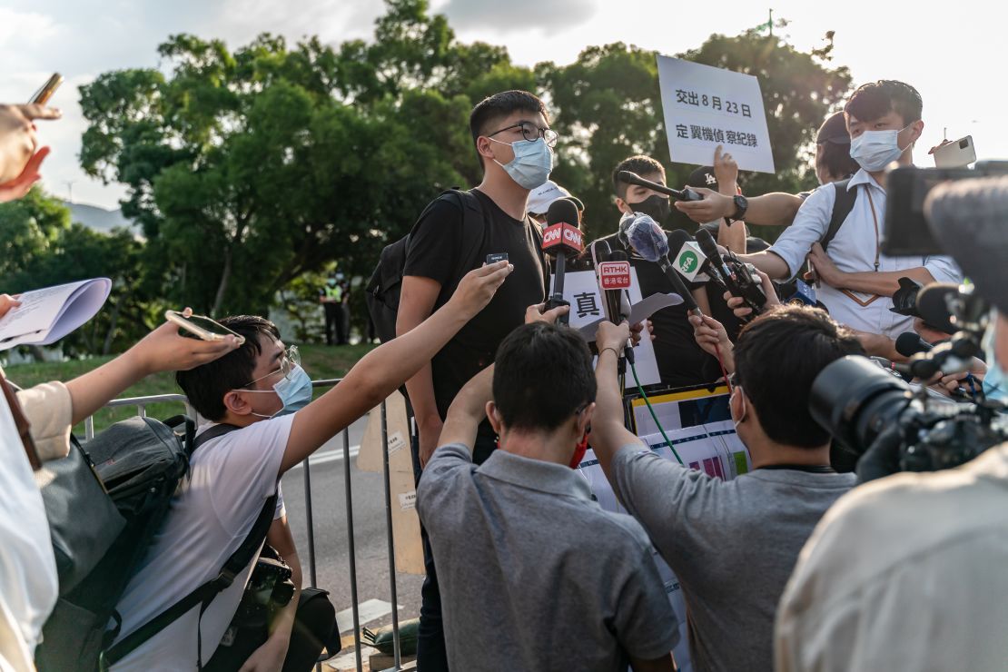 Pro-democracy activist Joshua Wong speaks to members of media outside the Government Flying Service on October 8, 2020.