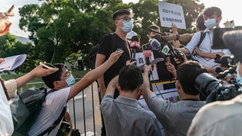 Pro-democracy activist Joshua Wong speaks to members of media outside the Government Flying Service on October 8, 2020.