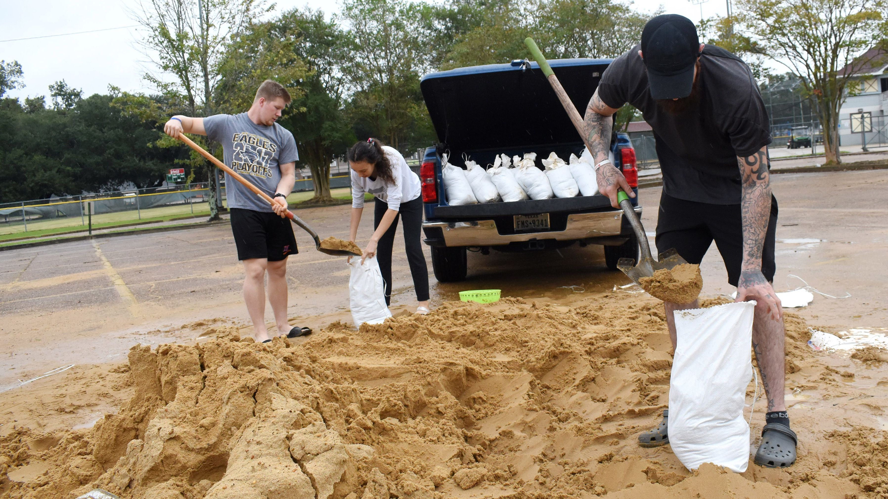 People fill sandbags in Alexandria, Louisiana, ahead of Hurricane Delta on October 9.