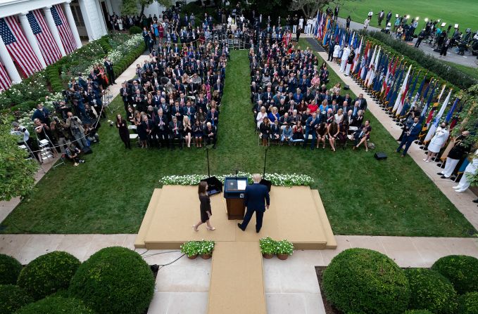 Barrett approaches the podium during the Rose Garden event on September 26. At least 12 people who attended the event — including President Trump — have since <a  target="_blank">tested positive for coronavirus.</a>