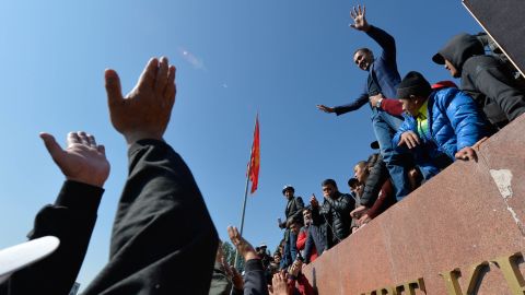 People protest during a rally in Bishkek, Kyrgyzstan, on October 7, 2020.