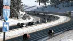 Thanksgiving holiday traffic travels on I- 70 in Genesee, Colorado on November 27, 2019. - - A pair of storms packing heavy snow and hurricane-force winds left tens of thousands without power in the United States on November 27, 2019, and wreaked havoc for Americans traveling for the Thanksgiving holiday. (Photo by Jason Connolly / AFP) (Photo by JASON CONNOLLY/AFP via Getty Images)