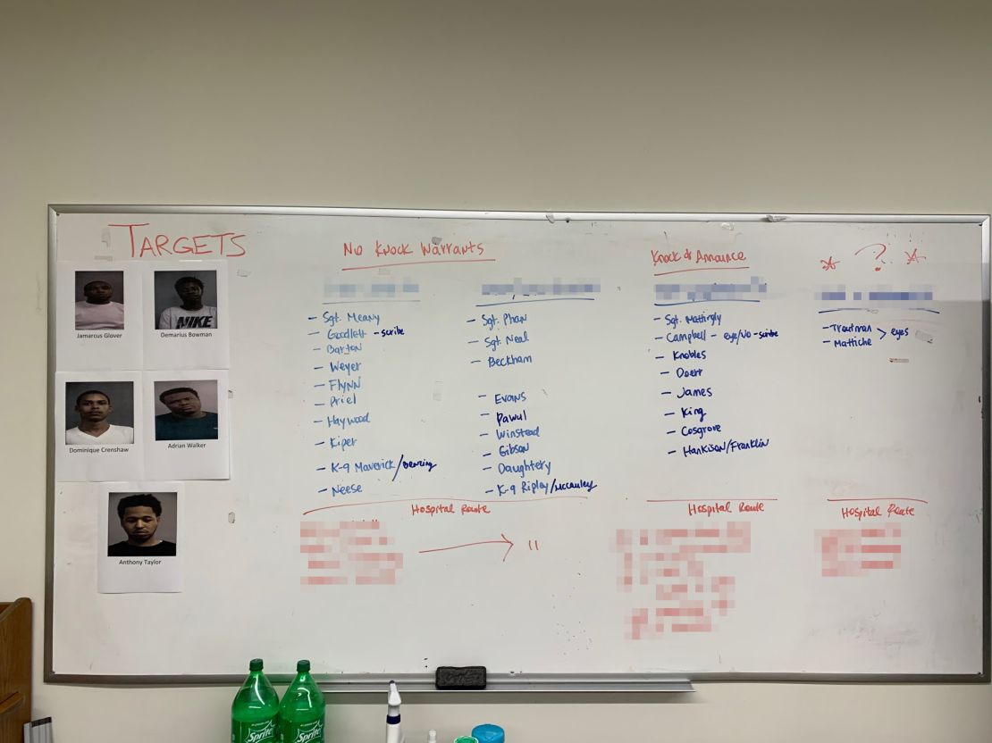 Included in the crime scene photos released by police is a picture of a white board with the title "No knock warrants" and "Knock and Announce" written at the top, and multiple addresses listed, including Taylor's. CNN obscured portions of this image to remove visible addresses.
