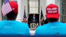 President Donald Trump speaks from the Blue Room Balcony of the White House to a crowd of supporters, Saturday, Oct. 10, 2020, in Washington. (AP Photo/Alex Brandon)