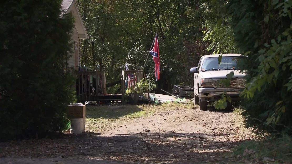The truck next to the house flying the Confederate flag had an upside-down Stars and Stripes on its antenna.