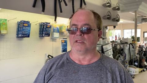 Briant Titus, inside his vacuum shop, was relieved the FBI had stopped the alleged plot.