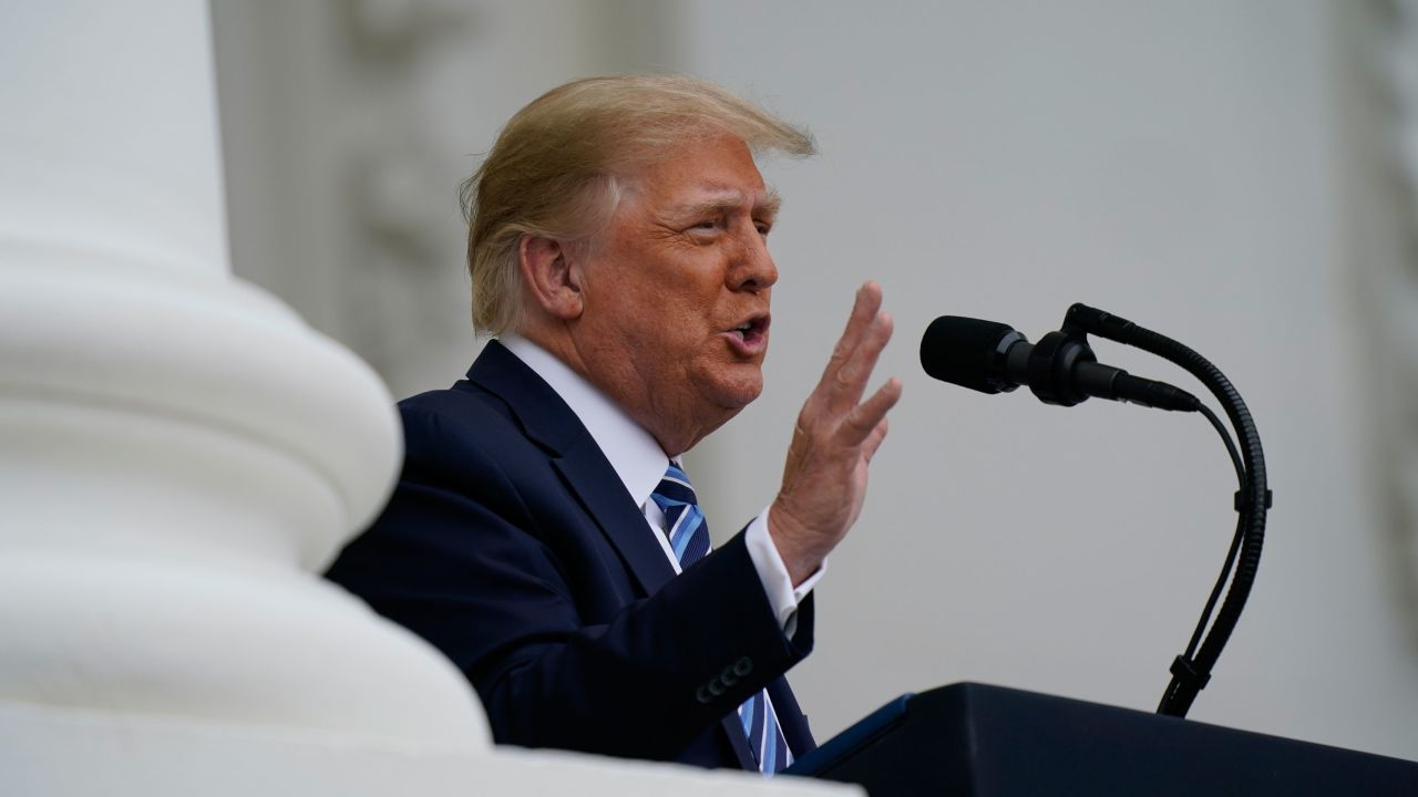 President Donald Trump speaks from the Blue Room Balcony of the White House to a crowd of supporters, Saturday, Oct. 10, 2020, in Washington. (AP Photo/Alex Brandon)