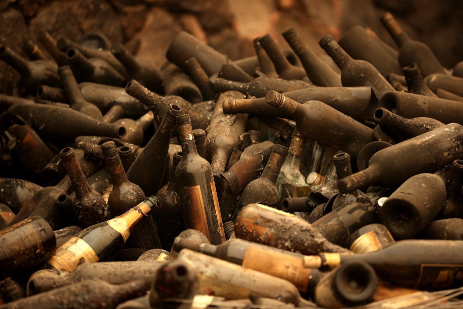 Burned bottles of wine sit in a pile at the Castello di Amorosa winery, which was destroyed by the Glass Fire in Calistoga, California, on October 1, 2020. Wildfires have damaged and <a href="https://www.cnn.com/2020/10/11/us/california-wildfires-wineries/index.html" target="_blank">destroyed dozens of the region's famed wineries,</a> many of them family-owned businesses.