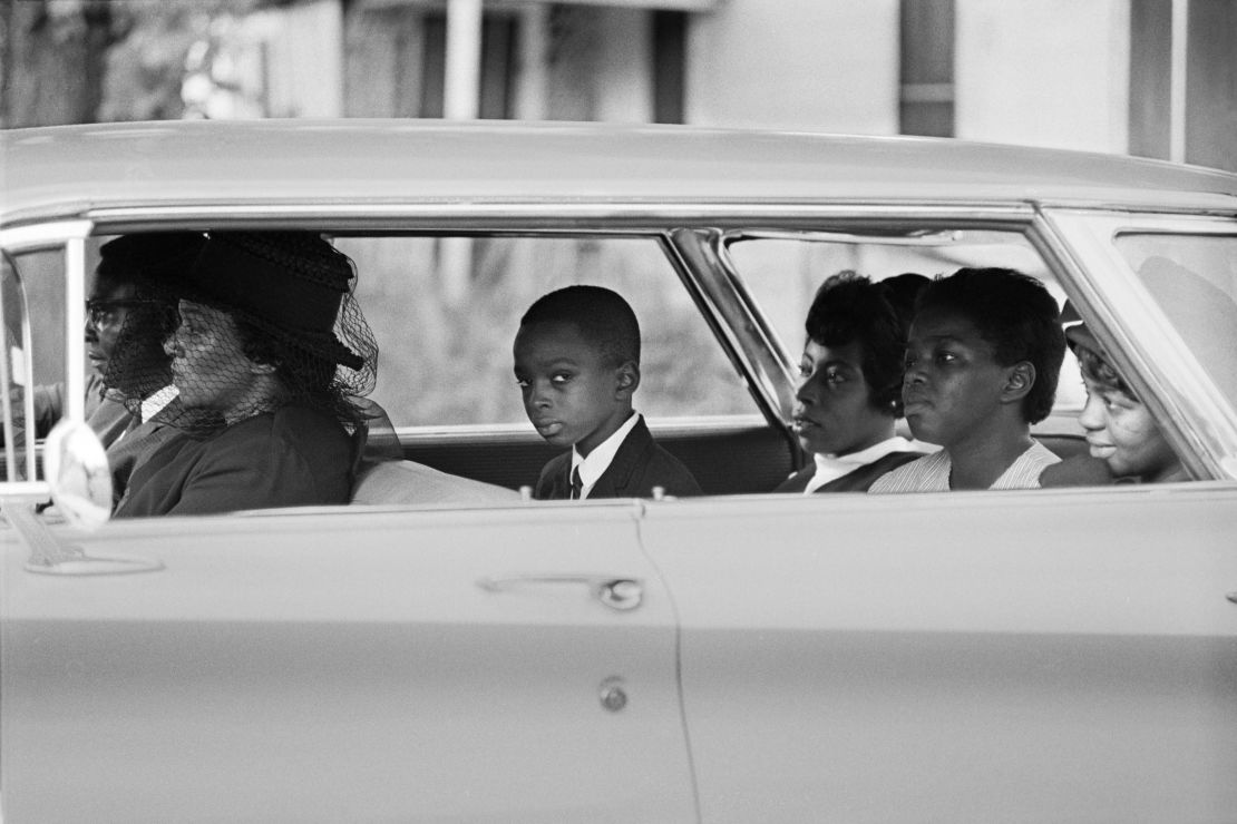 Ben Chaney, center, in the car on the way to his brother's funeral, August 1964, Mississippi (Bill Eppridge).