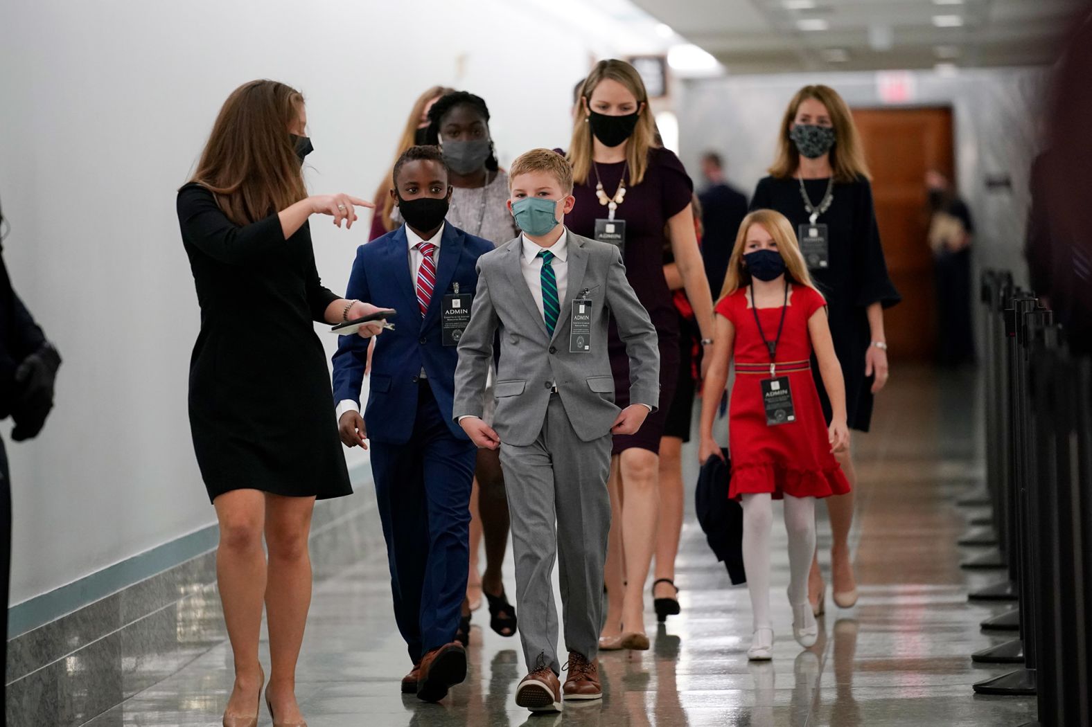 Barrett's children arrive for her hearing on October 12.