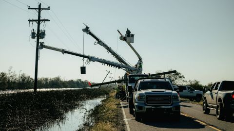 Utility crew work to restore power after Hurricane Delta made landfall in Pecan Island, Louisiana, on Saturday, Oct. 10, 2020.