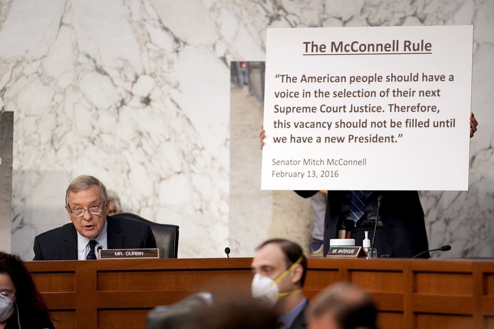 Durbin, a Democrat from Illinois, makes his opening statement on October 12. Democrats argued that Republicans should not be pushing ahead with the nomination, referencing how Senate Republicans blocked consideration of Merrick Garland after his nomination by former President Obama in 2016.