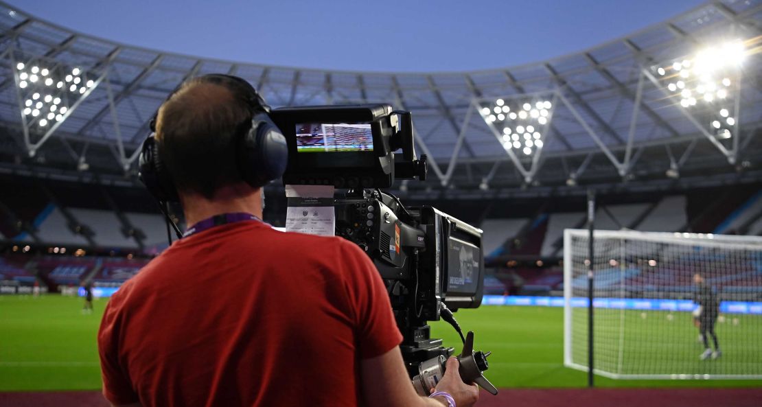 A television cameraman follows the action during the English Premier League football match between West Ham United and Newcastle United.
