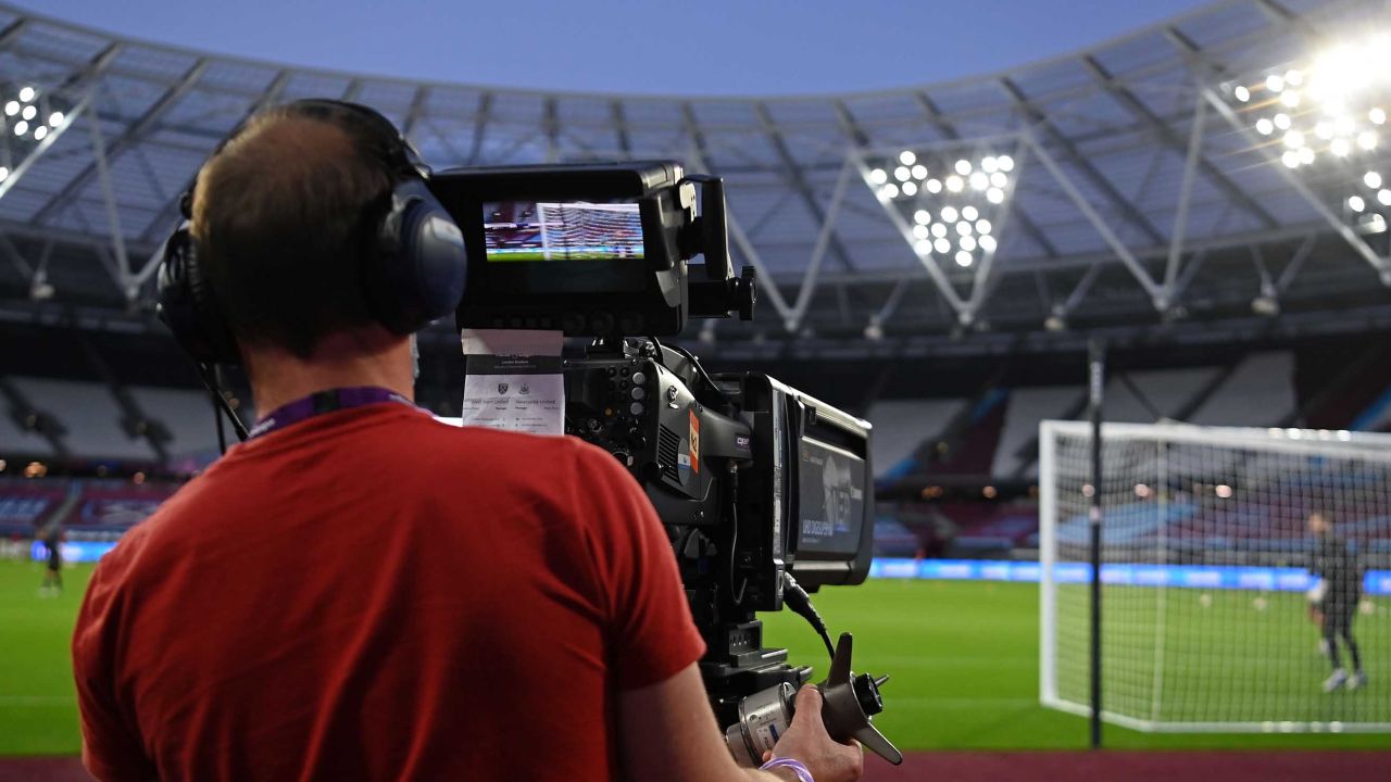A television cameraman follows the action during the English Premier League football match between West Ham United and Newcastle United.