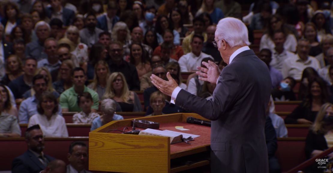 Pastor John MacArthur speaking at his California church in August. CNN has blurred a portion of this image to protect a child's identity. 