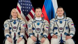 (July 30, 2020) Expedition 64 crew members (from left) NASA astronaut Kate Rubins and cosmonauts Sergey Ryzhikov and Sergey Kud-Sverchkov pose for a crew portrait during crew training at Gagarin Cosmonaut Training Center in Star City, Russia.