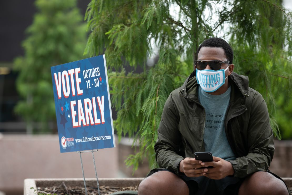 Cadarius Parks sits outside of State Farm Arena, Georgia's largest early-voting location, after casting his ballot on October 12, 2020, in Atlanta.