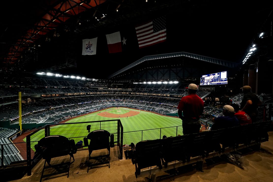 Empty stands, masked players as baseball returns