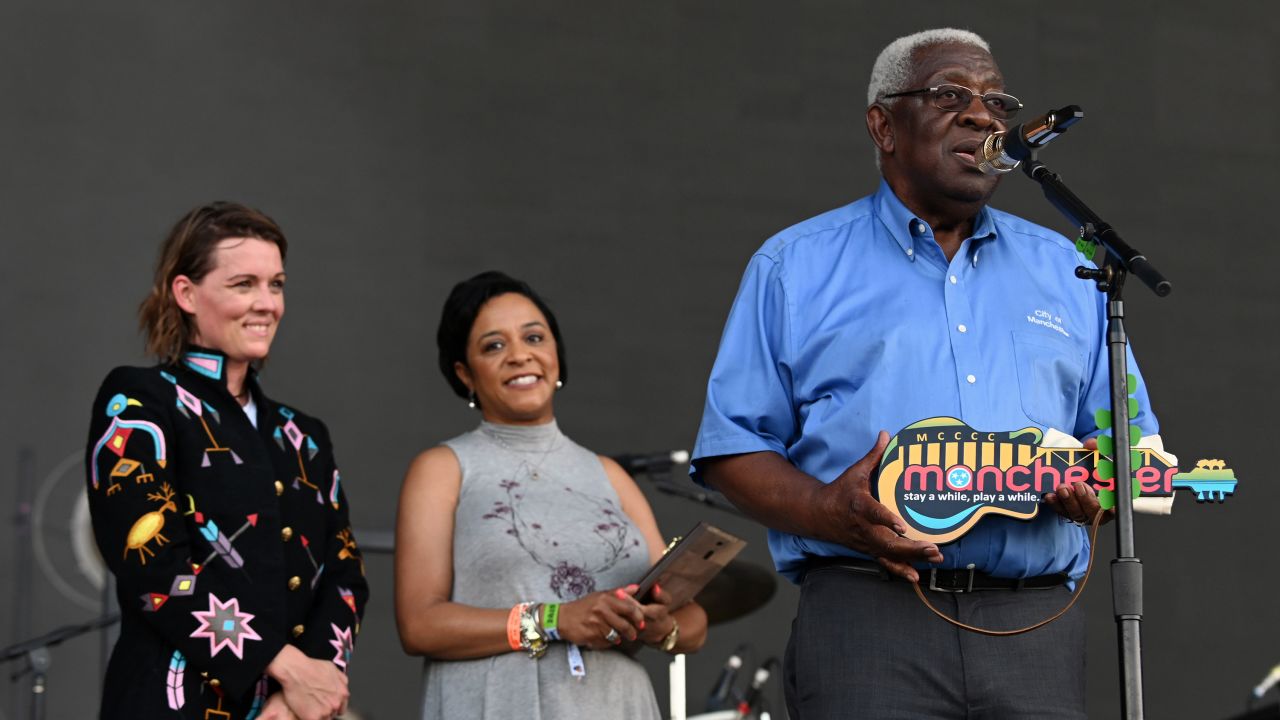 Manchester Mayor Lonnie Norman (right) onstage during the Bonnaroo Music and Arts Festival on June 16, 2019.