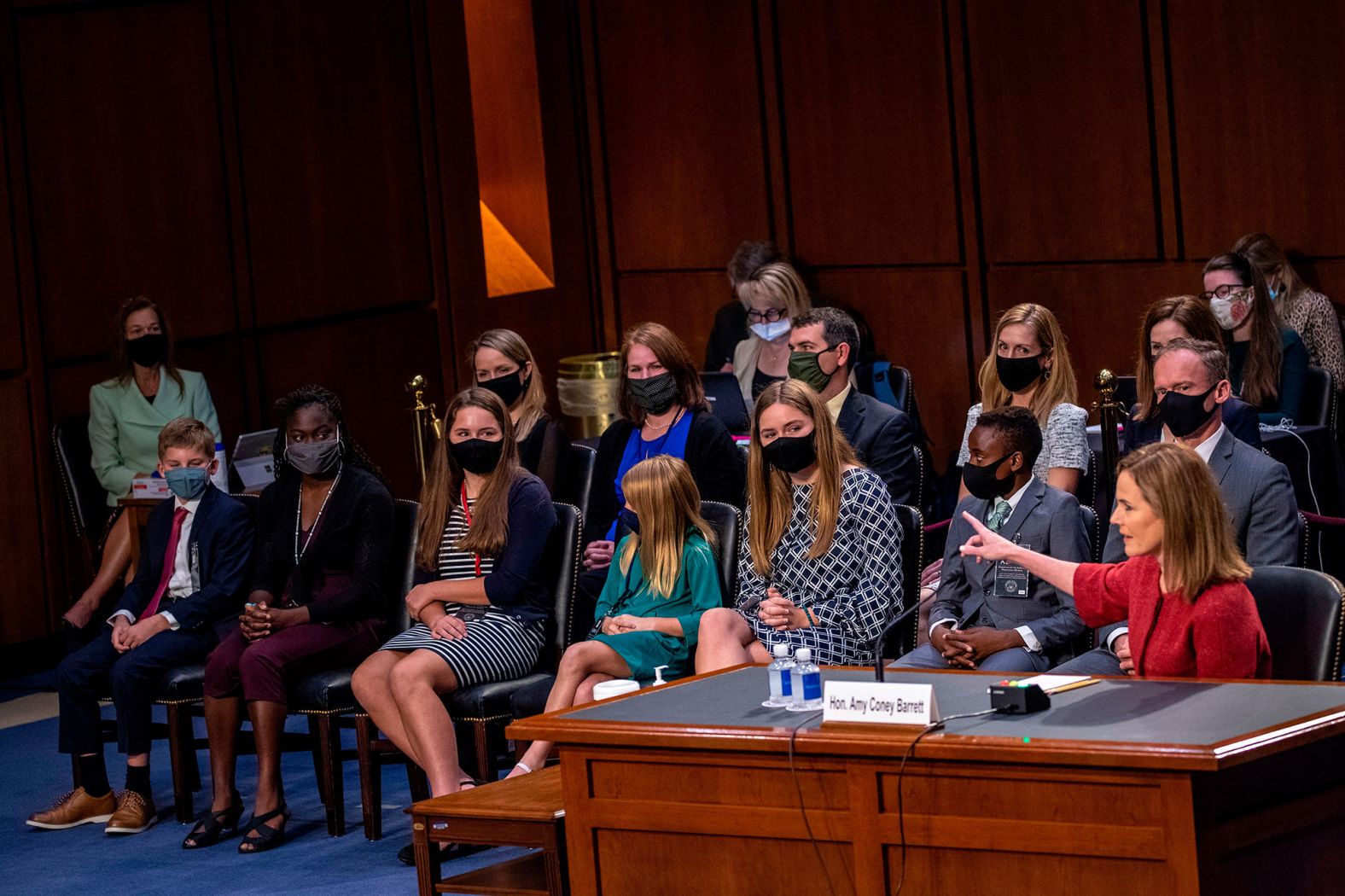 Barrett introduces her family during her hearing on October 13. She and her husband, Jesse, have seven children.