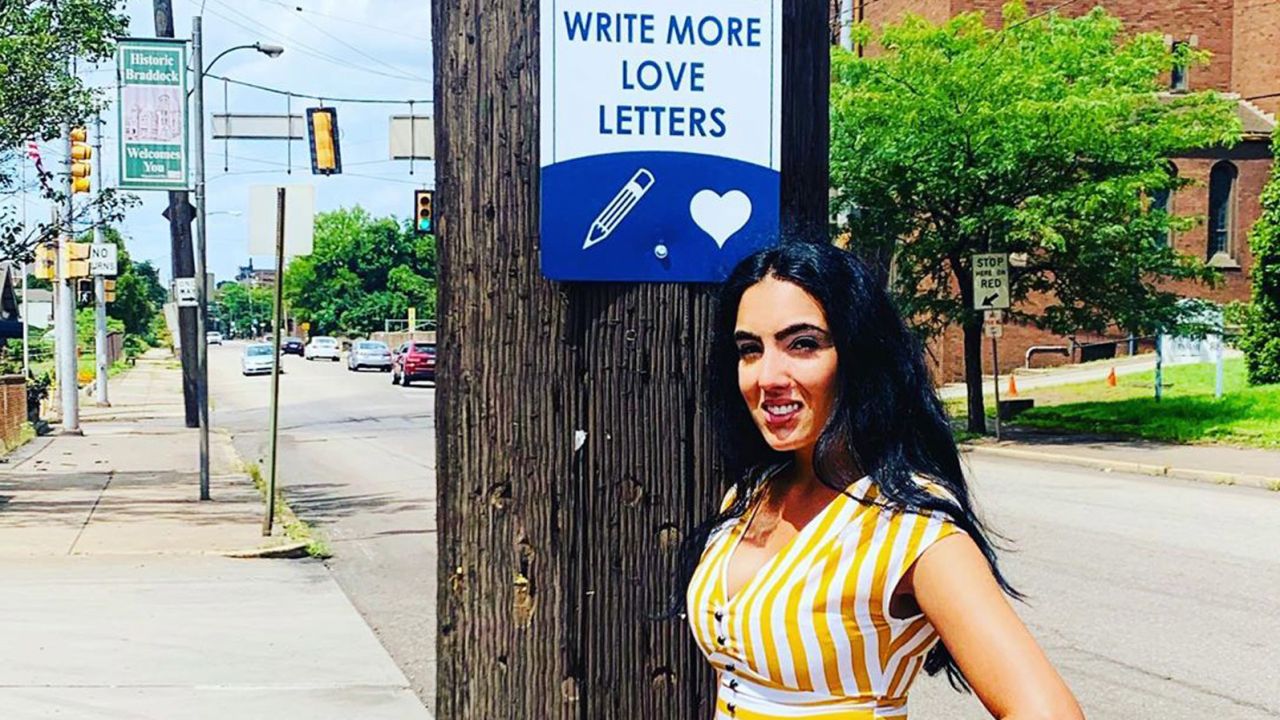 One of Braddock's signs encouraged folks to write more love letters, which Fetterman enjoys doing.