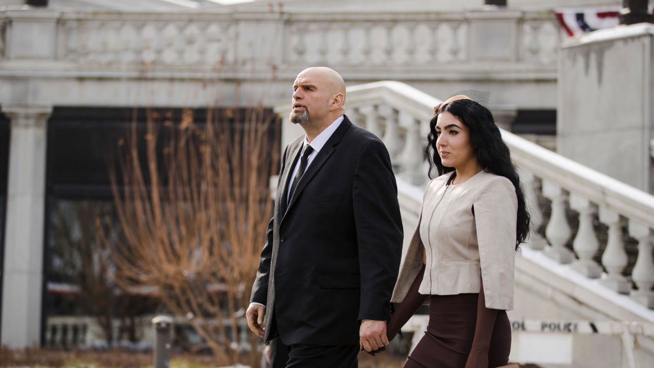 John and Gisele Fetterman walk to Pennsylvania Gov. Tom Wolf's inauguration last year.