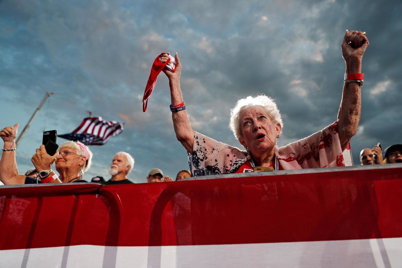 People cheer for Trump at a campaign rally at Cecil Airport in Jacksonville, Florida, on September 24.