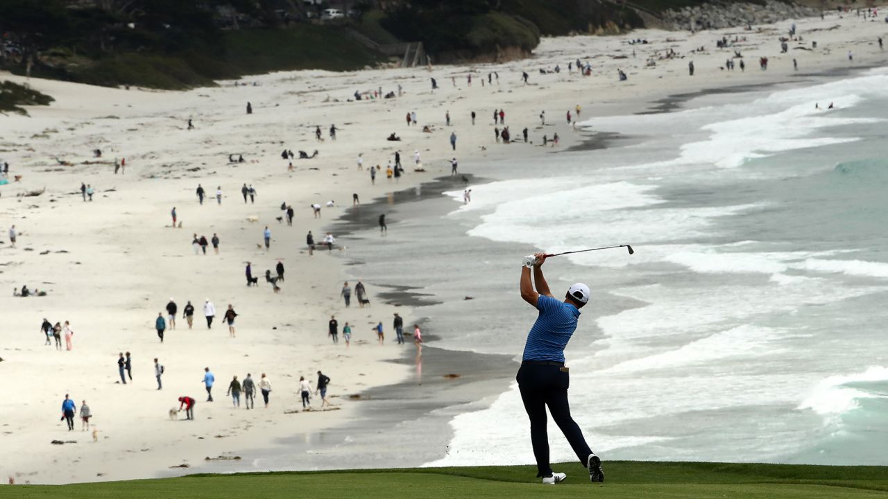 Rahm plays a second shot on the ninth hole during the third round of the 2019 US Open at Pebble Beach.