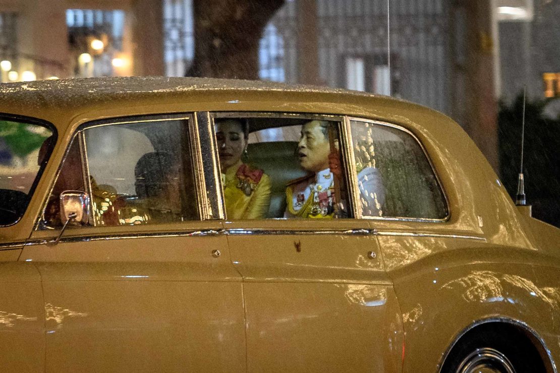 Thailand's King Maha Vajiralongkorn, right, rides with Queen Suthida, center, and Princess Bajrakitiyabha, as they leave the Grand Palace in Bangkok following a ceremony marking the fourth anniversary of the late King Bhumibol Adulyadej on Tuesday.