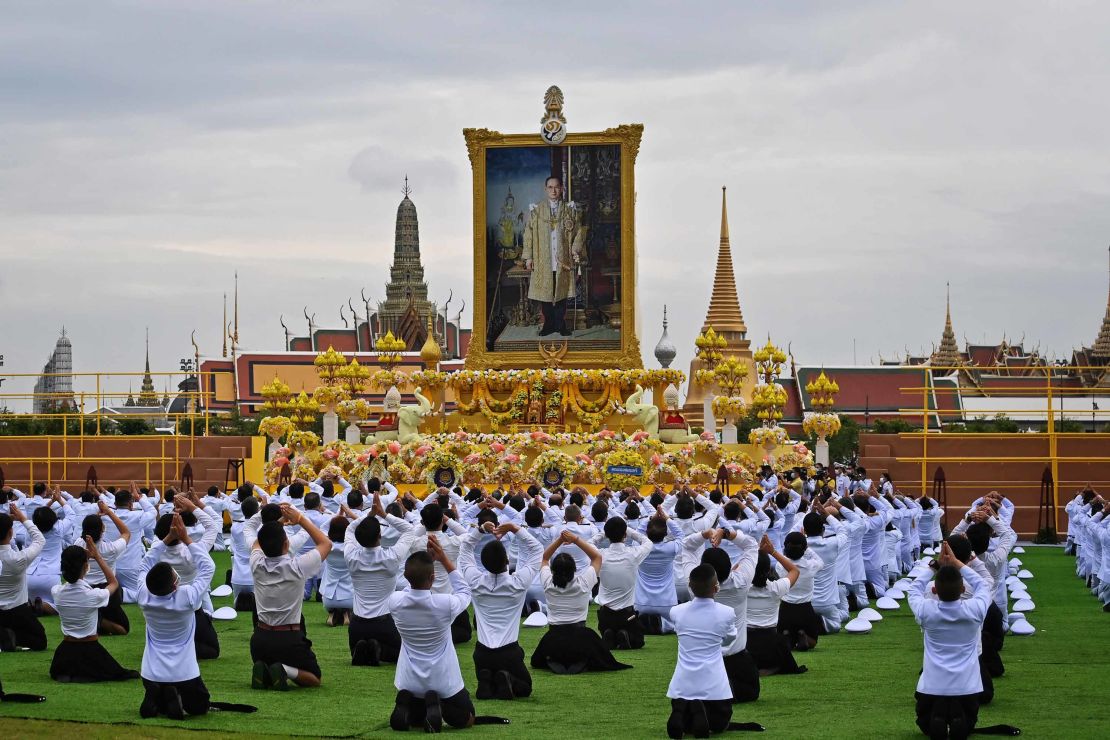 Students pay their respects before the portrait of the late Thai King Bhumibol Adulyadej during a ceremony marking the fourth anniversary of his death, on October 13.