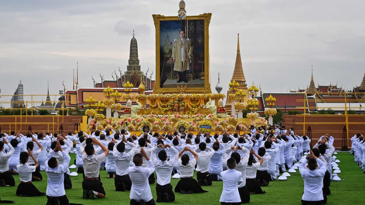 Students pay their respects before the portrait of the late Thai King Bhumibol Adulyadej during a ceremony marking the fourth anniversary of his death, on October 13.