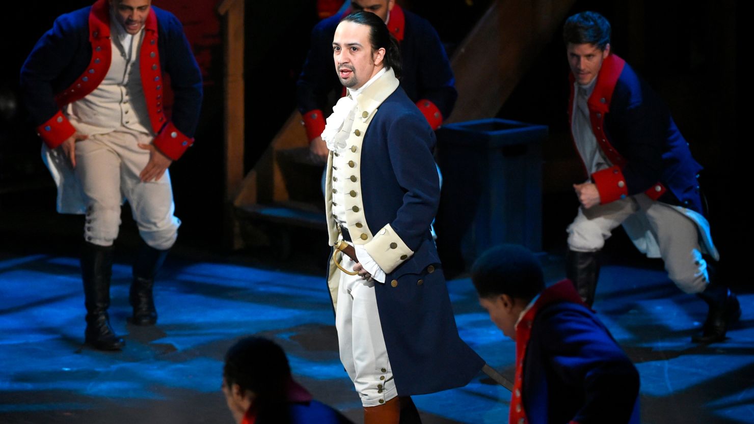FILE - In this June 12, 2016 file photo, Lin-Manuel Miranda and the cast of "Hamilton" perform at the Tony Awards in New York. A filmed version of the original Broadway production will be available Friday, July 3, on Disney Plus. (Photo by Evan Agostini/Invision/AP, File)
