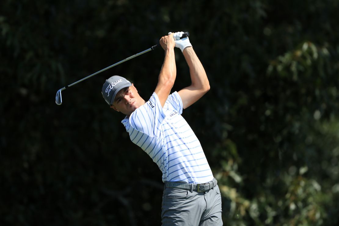 Thomas plays his shot from the third tee during the third round of the TOUR Championship on September 6, 2020. 
